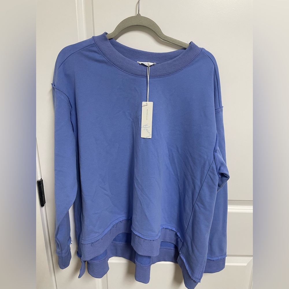 NWT!! M/L BluIvy sweatshirt with super cute distressed hem line
